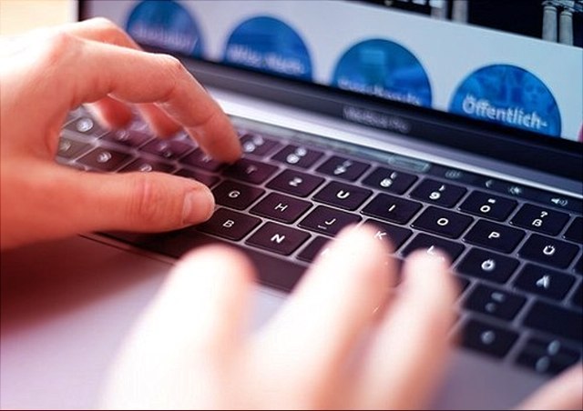 Person in front of a laptop